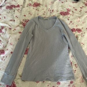 brown and blue long sleeve